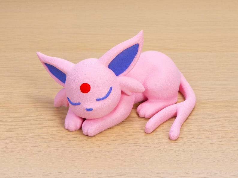 Pink sleepy Espeon collectible figurine